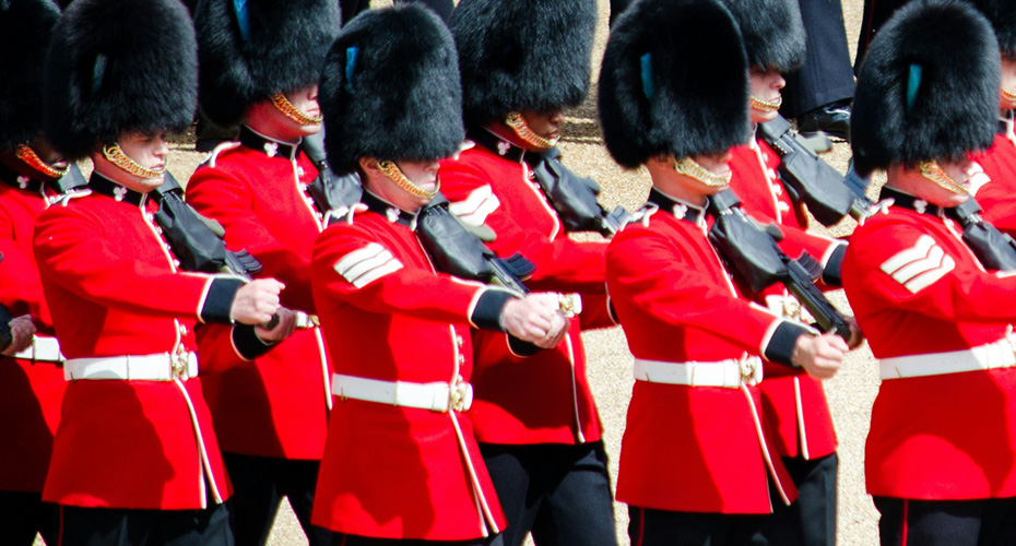 An image of the Irish guards in dress uniform marching