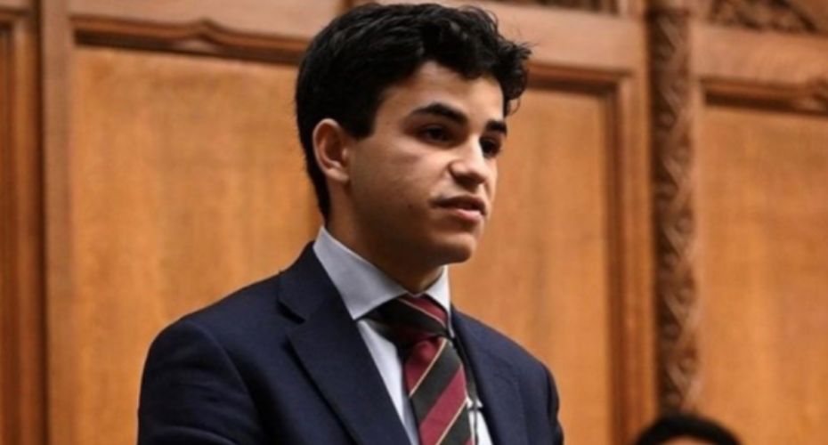 Louis man in suit wearing a tie in youth parliament