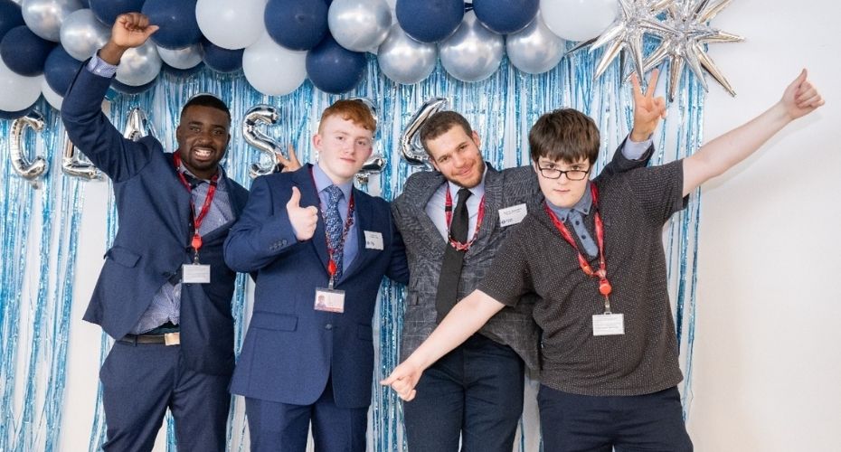 Group photo of our four male participants and the Supported Internship graduation.