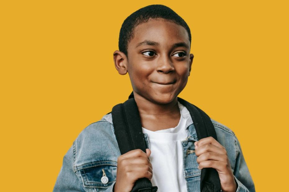 Young boy with rucksack