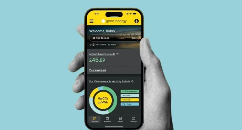 An image of a hand holding a phone with the app or website for Good energy.