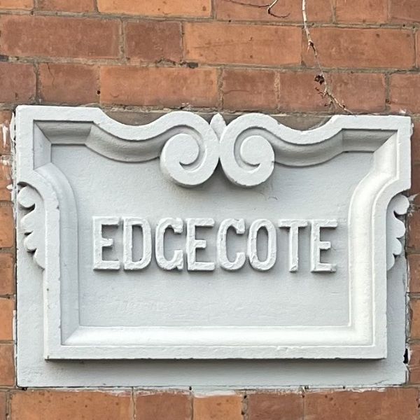 Photo of a sign reading "Edgecote"