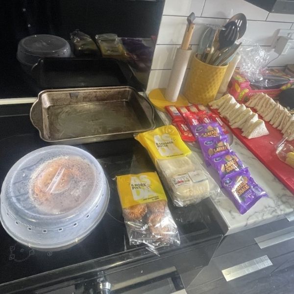 Photo of a counter with a variety of food on.