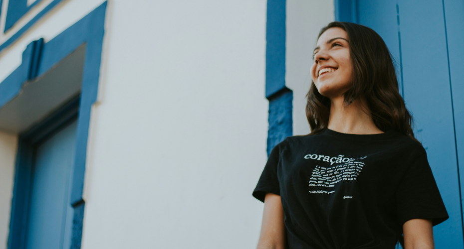 A teenage girl outside a house