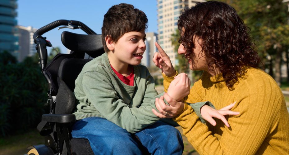 Woman with a child in wheel chair