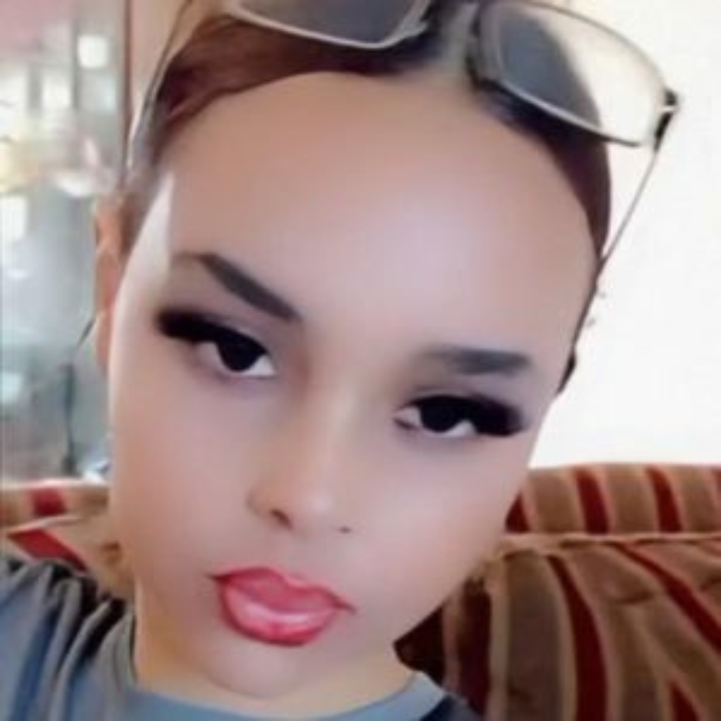 Young girl with glasses ontop of head