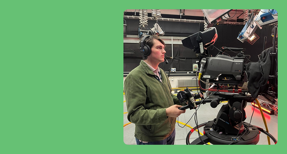 John standing in front of camera