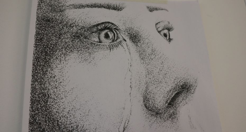 artist drawing of person crying