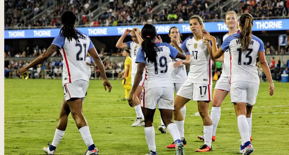 A group of women on a football pitch