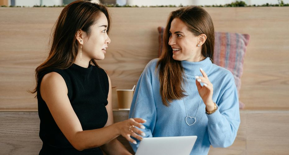 Two people talking - future employment support (FES)